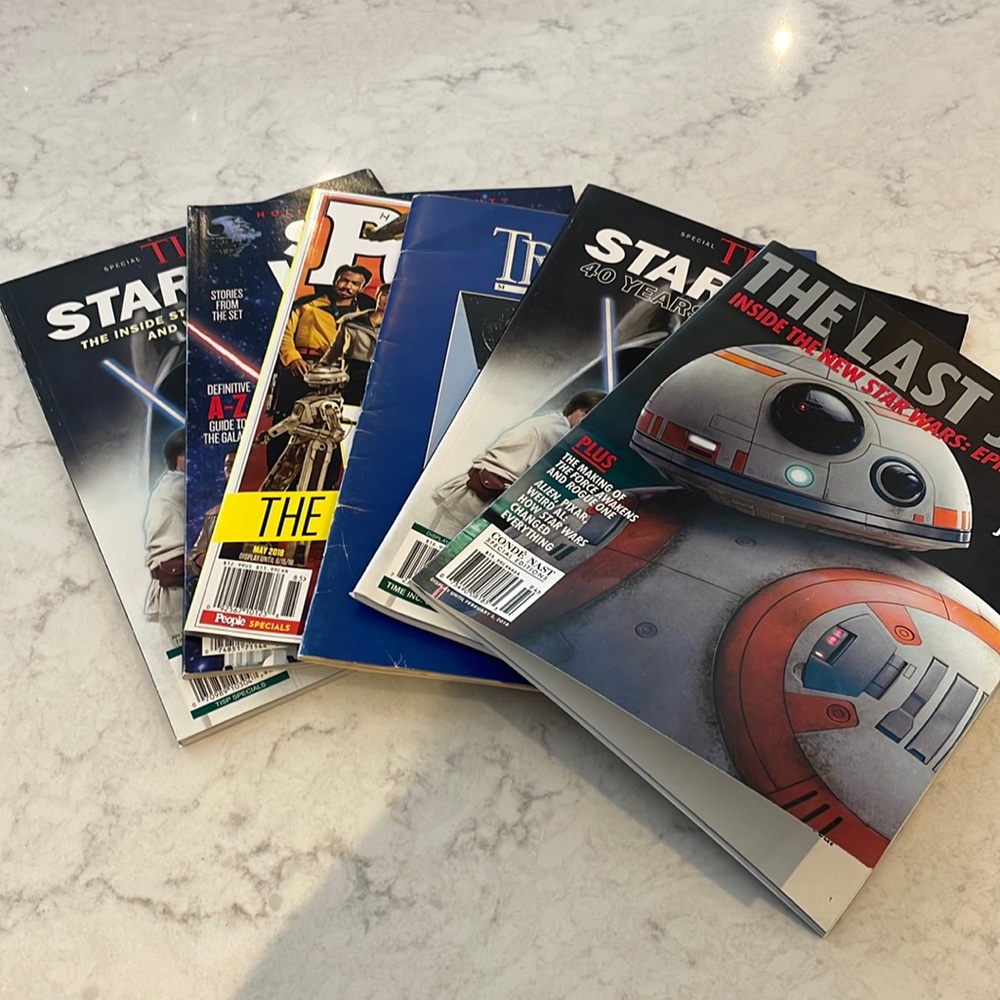 Assorted magazines featuring Star Wars. Includes one vintage Tribute Magazine.